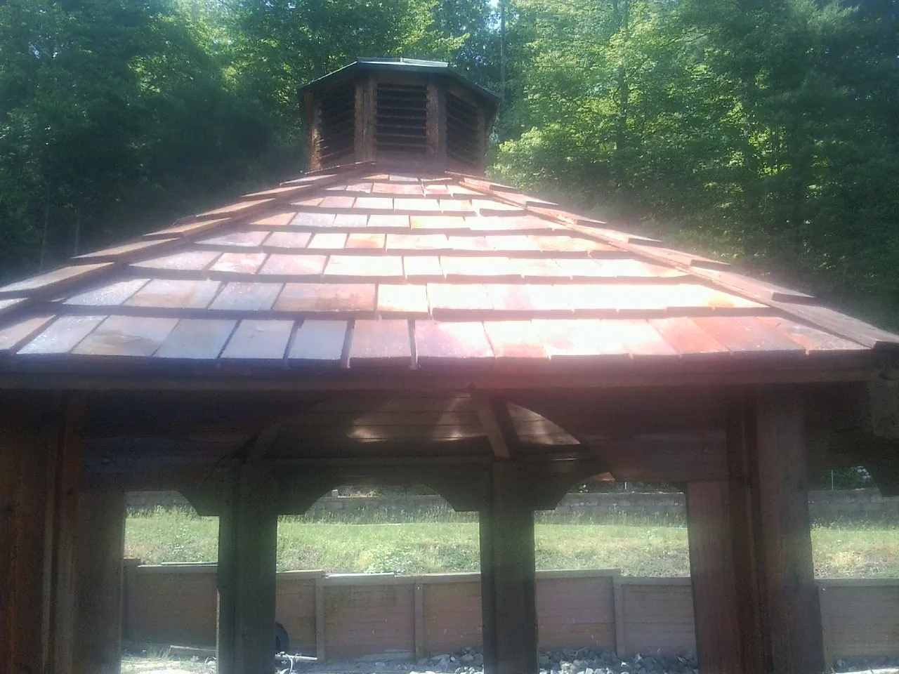 New cedar shake roof and cupola on a lakeside gazebo in Waymart
